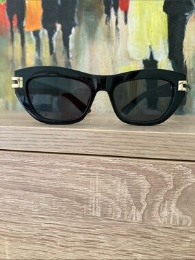 Women's Black Cat-Eye Sunglasses with Gold Temple Detail